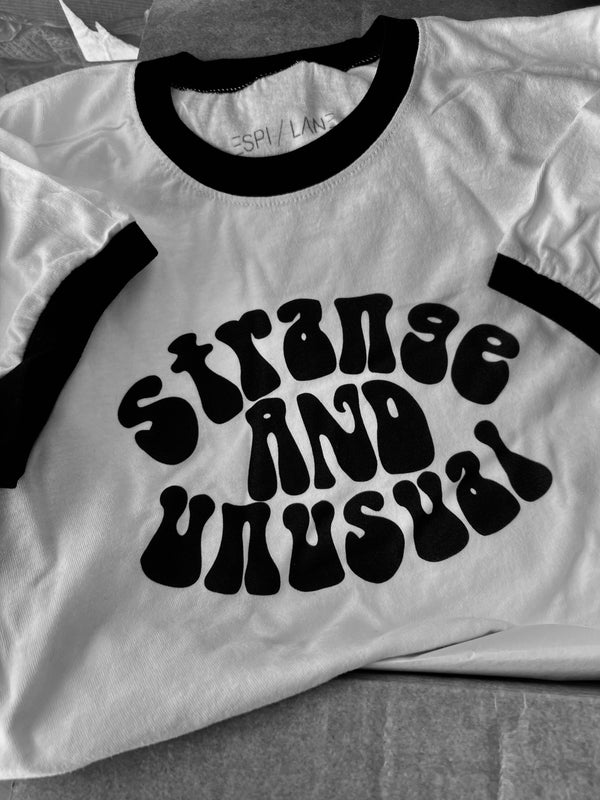 Strange and Unusual Ringer Tee